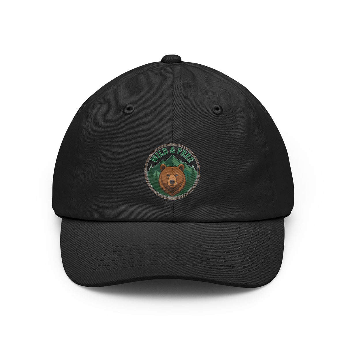 Vintage wild and free wilderness design on a Wander Wild Co dad cap
