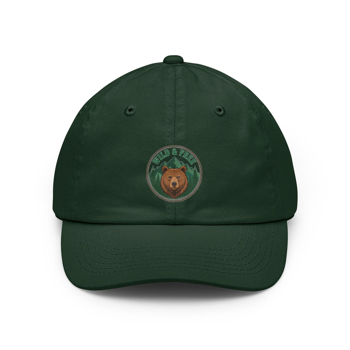 Vintage wild and free wilderness design on a Wander Wild Co dad cap