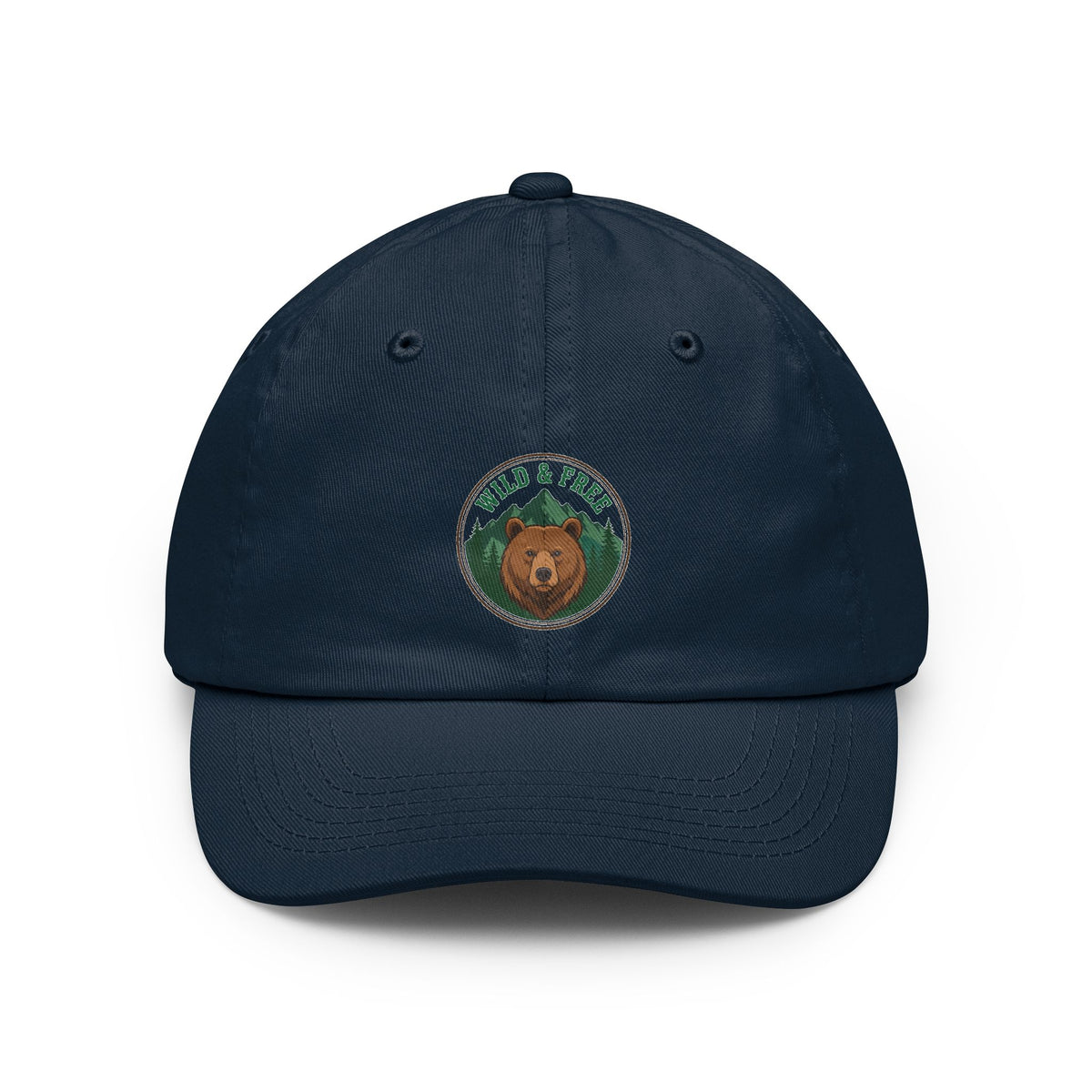 Vintage wild and free wilderness design on a Wander Wild Co dad cap