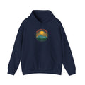 Retro wanderlust badge graphic on a Wander Wild Co vintage pullover hoodie
